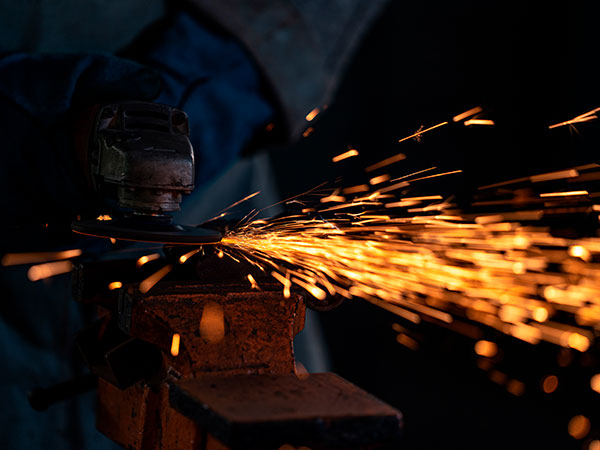 Welder with sparks causing fire